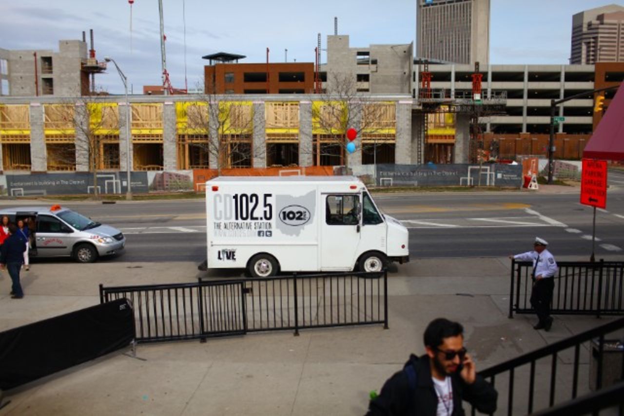 A CD102.5 truck parks outside a concert venue in Columbus.