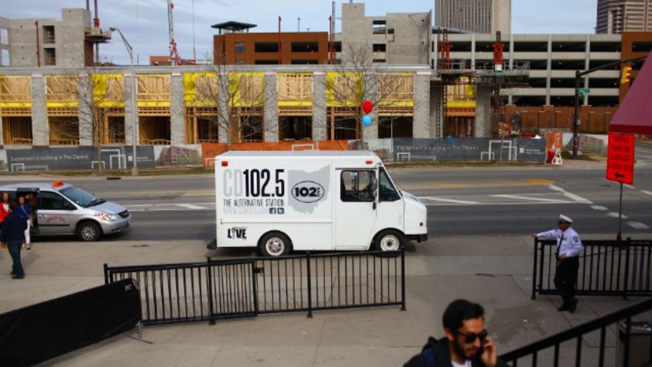 A CD102.5 truck parks outside a concert venue in Columbus.
