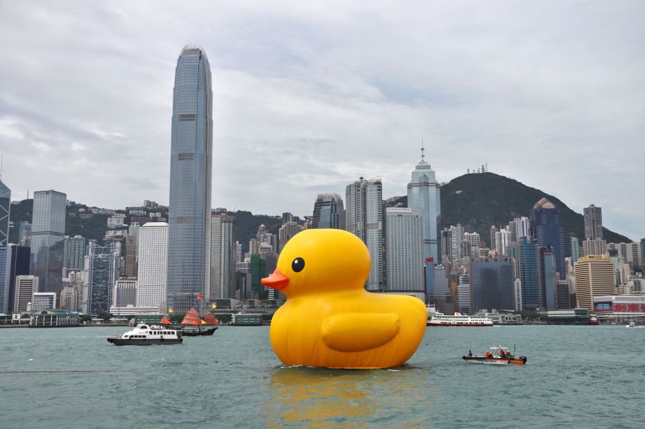 The duck added a surreal touch to the city's iconic skyline. No doubt those in the Central financial district found time in their busy days to post countless photos to social media taken from their high office perches.