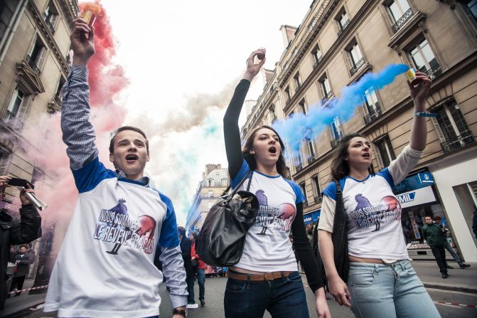 Hundreds of supporters of Marine Le Pen, leader of France's far-right National Front party, took to the streets on May Day Wednesday as part of the day's celebrations in images captured by<a > iReporter Batareykin</a>.