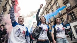 Hundreds of supporters of Marine Le Pen, leader of France's far-right National Front party, took to the streets on May Day Wednesday as part of the day's celebrations in images captured by iReporter Batareykin.