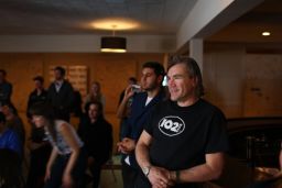 CD102.5 general manager Randy Malloy watches a band perform at the station.