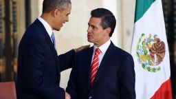 Obama Nieto handshake.gi