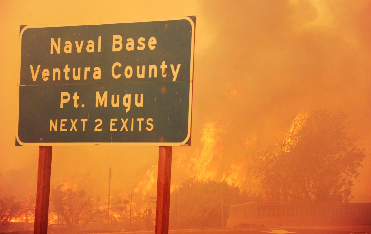 Fire burns along the Pacific Coast Highway close to the Naval Base near Point Mugu, California, on May 3.