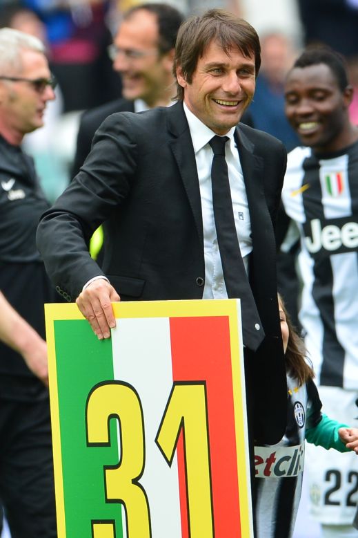 Coach Antonio Conte celebrated after leading his team to a second successive scudetto. 