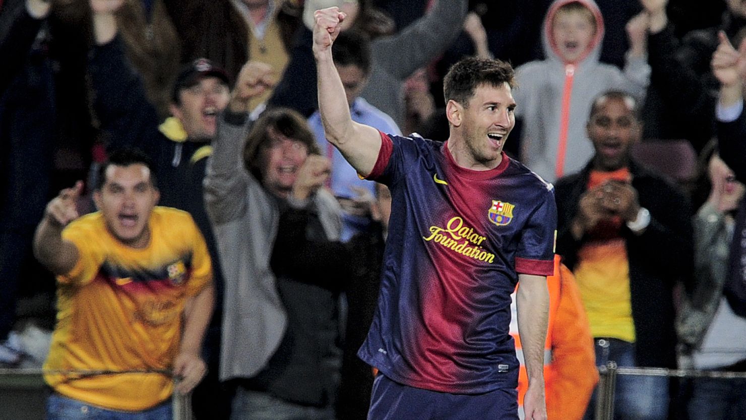 Barcelona forward Lionel Messi celebrates his first goal during Sunday's 4-2 Spanish league win over Real Betis.