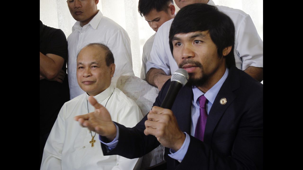 Pacquiao speaks at a news conference during the Catholic Bishops Conference of the Philippines in May 2011.