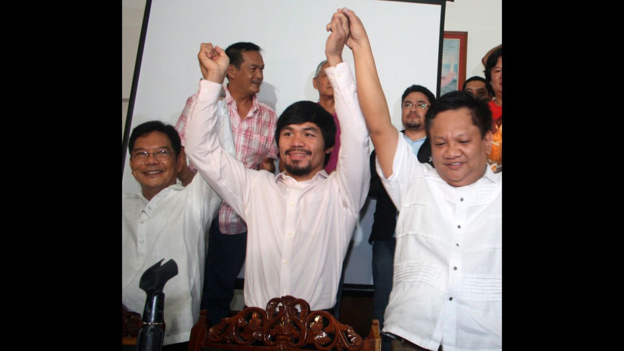 Pacquiao celebrates with local officials during his proclamation as congressman of Sarangani province in May 2010.