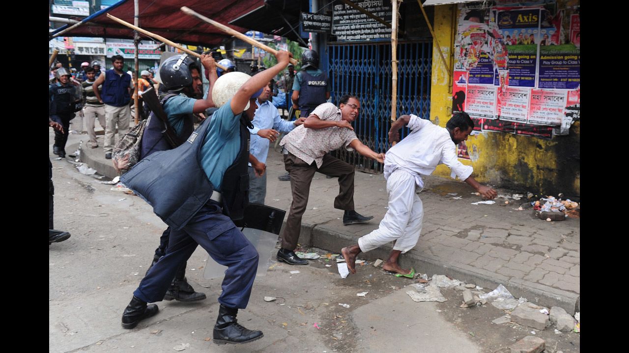Bangladeshi police charge at Islamists with batons during clashes on May 5.