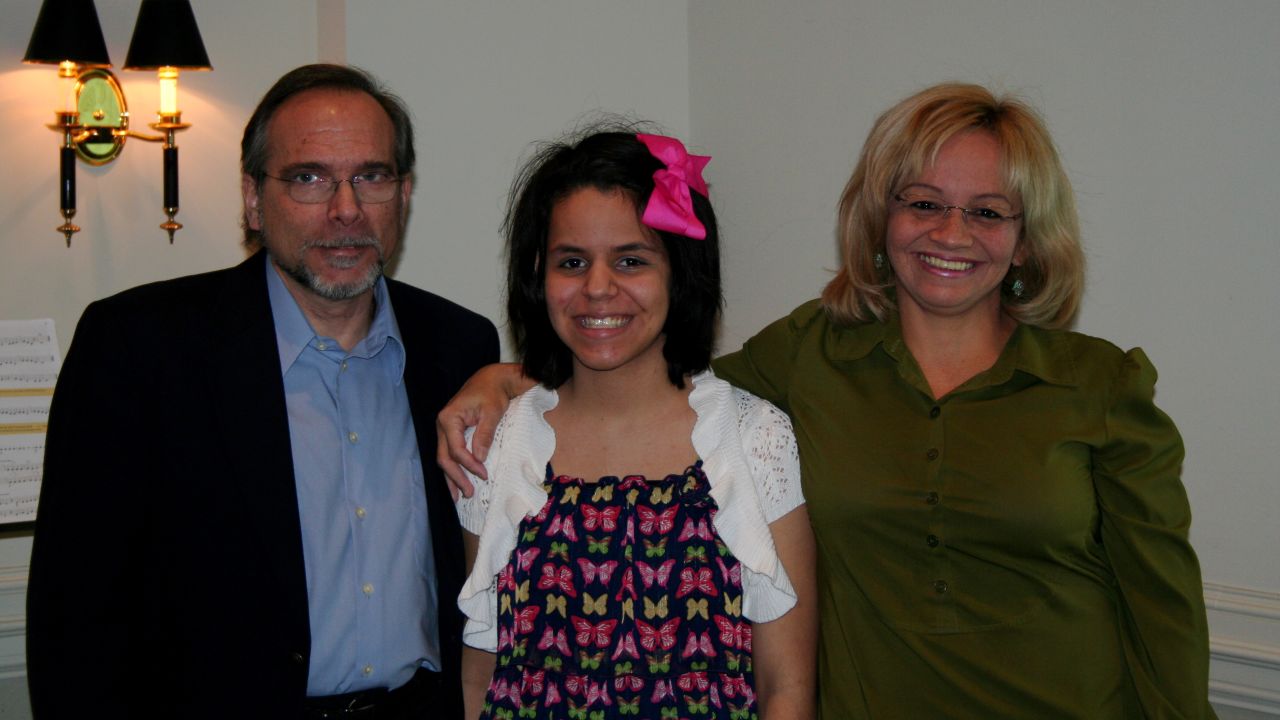 The dream team: Mano with her dad, a music professor, and mom, a counselor