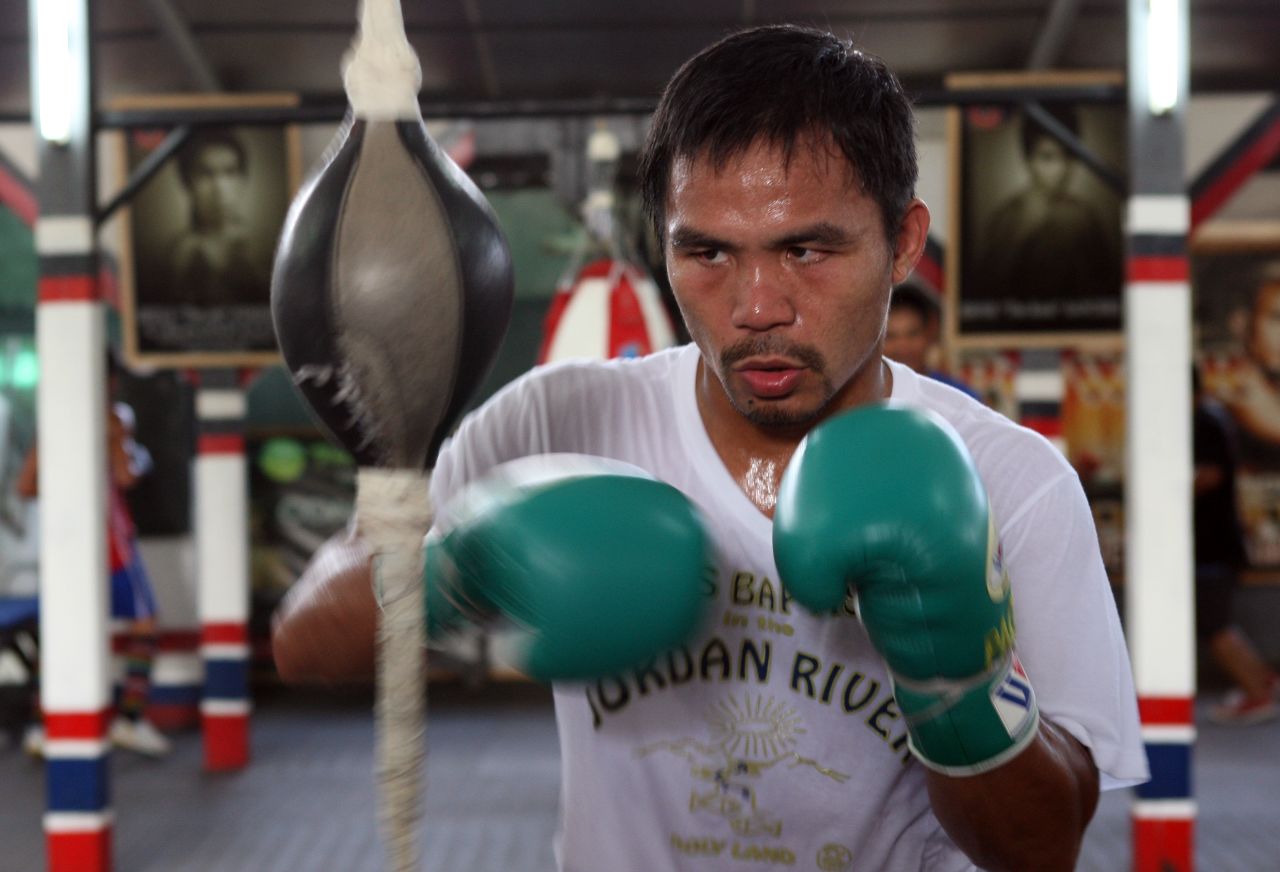 Manny Pacquiao is known the world over for his boxing abilities, but in the Philippines he's also a national hero beyond the ring. Click through to see moments of Pacquiao's life. 