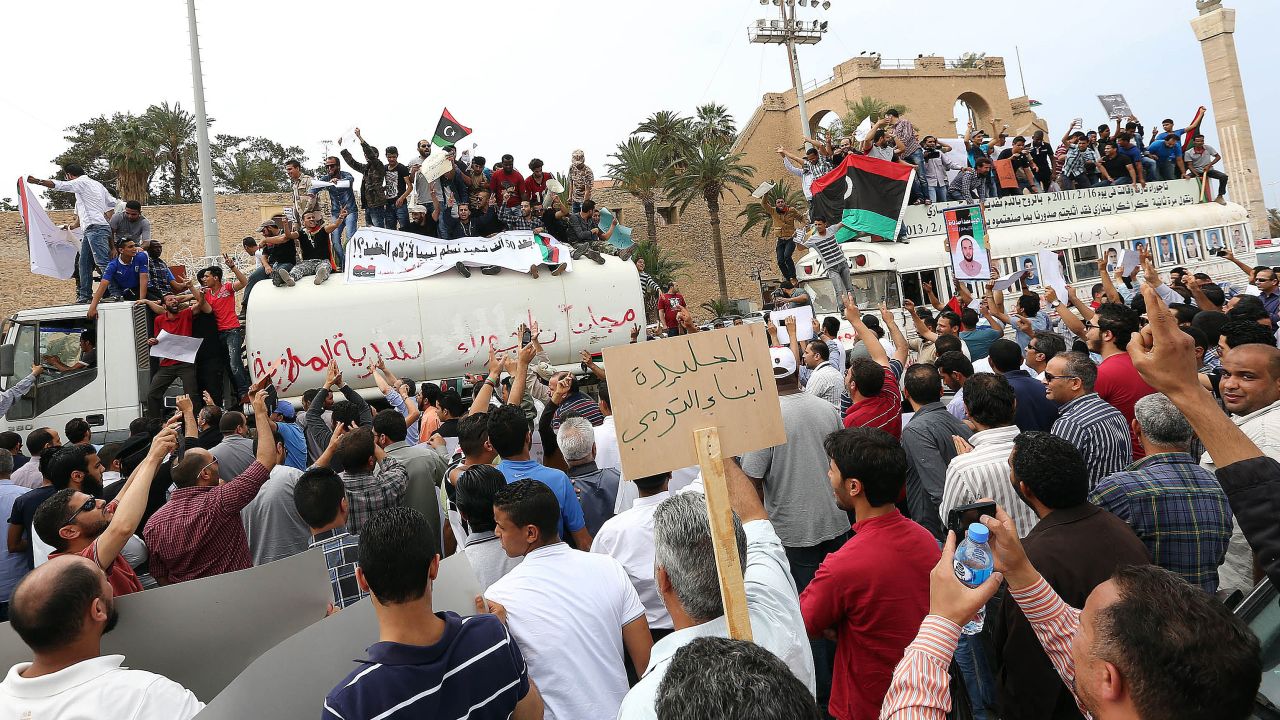 Protesters are pictured during a demonstration supporting the political isolation law in Tripoli's Martyrs Square on Sunday.