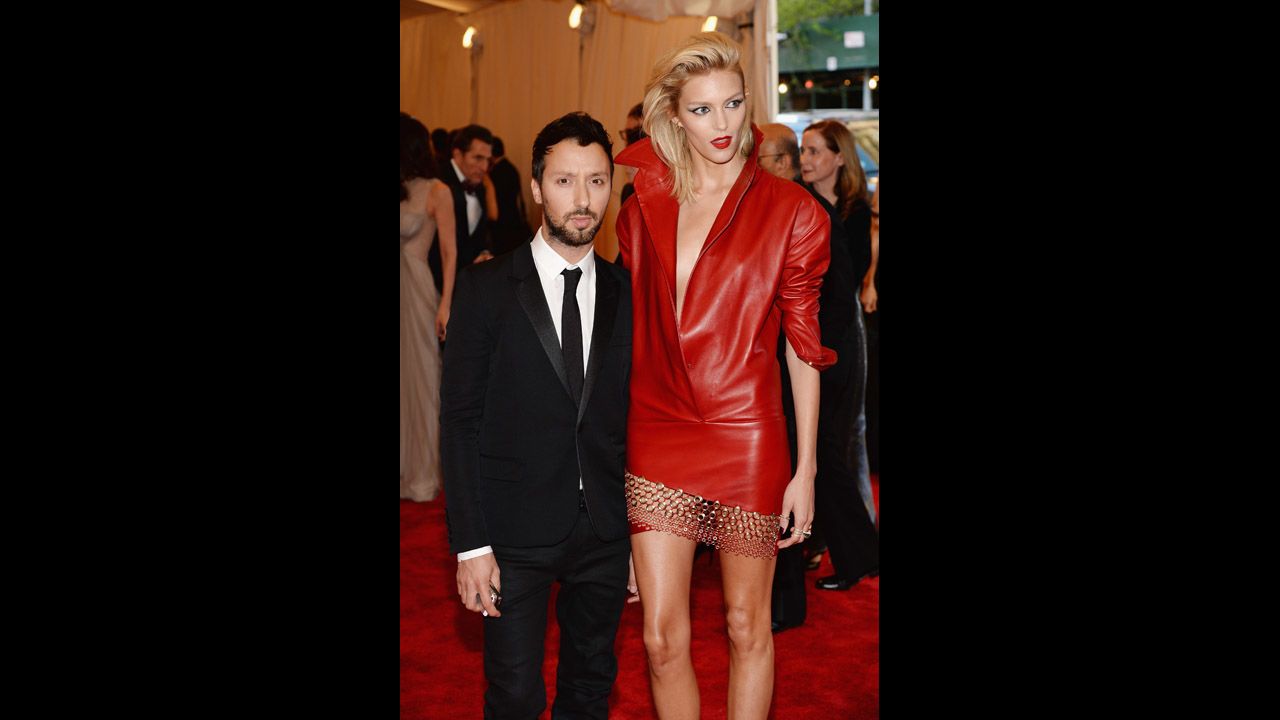 Designer Anthony Vaccarello and model Anja Rubik attend the gala.