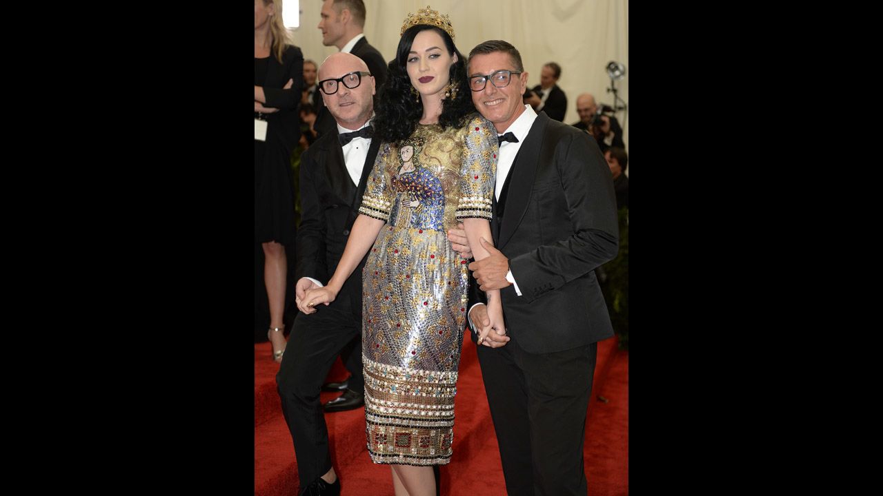 Stefano Gabbana, left, Katy Perry and Domenico Dolce attend the gala.
