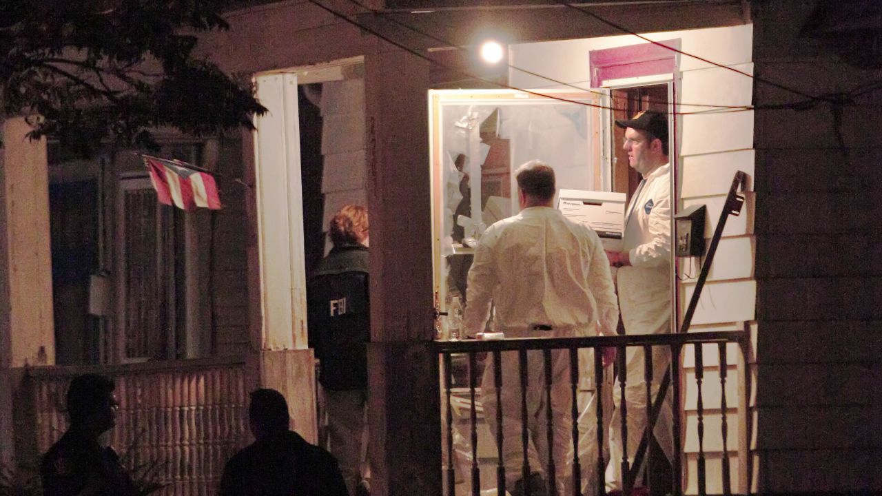 FBI agents remove evidence from the house May 7.