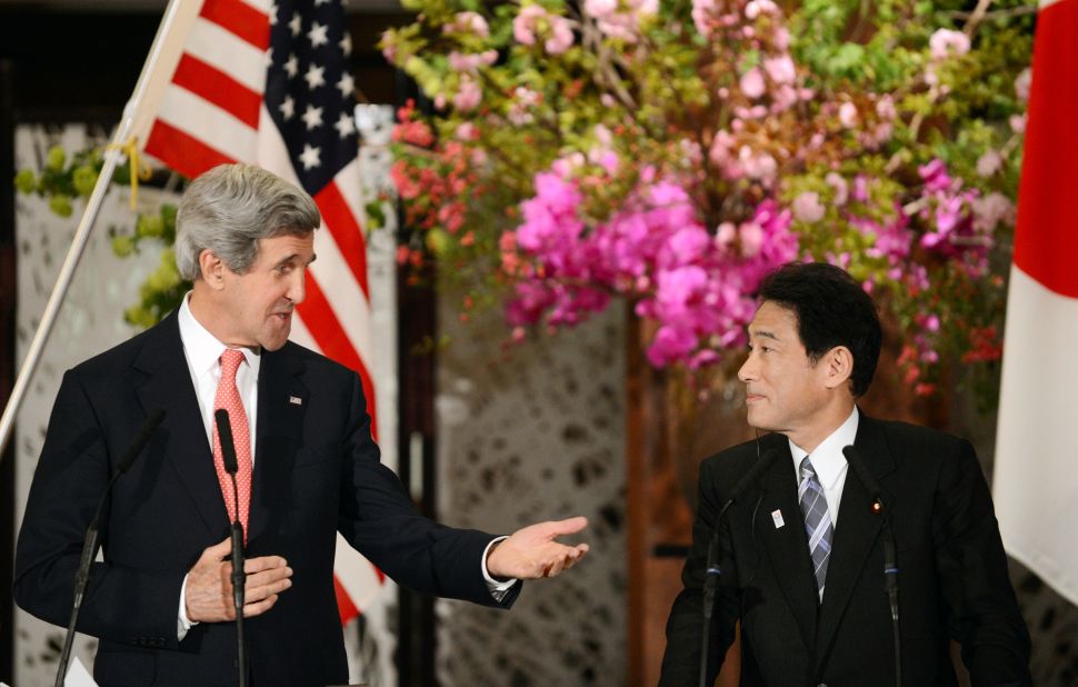 Kerry gestures to Japanese Foreign Minister Fumio Kishida (R) during their joint press conference  in Tokyo on April 14, 2013. Kerry traveled to Asia to discuss nuclear tensions on the Korean peninsula and secured vital support from China to help defuse the weeks-long crisis.