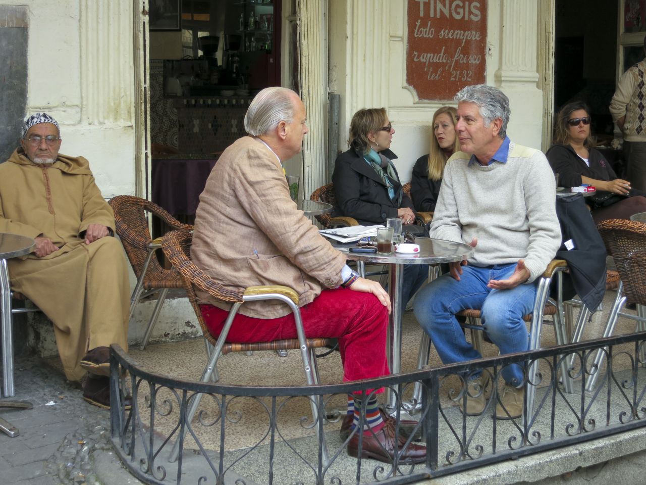 Anthony Bourdain, right, talks with British ex-pat Jonathan Dawson at Cafe Tingis in Tangier, Morocco.