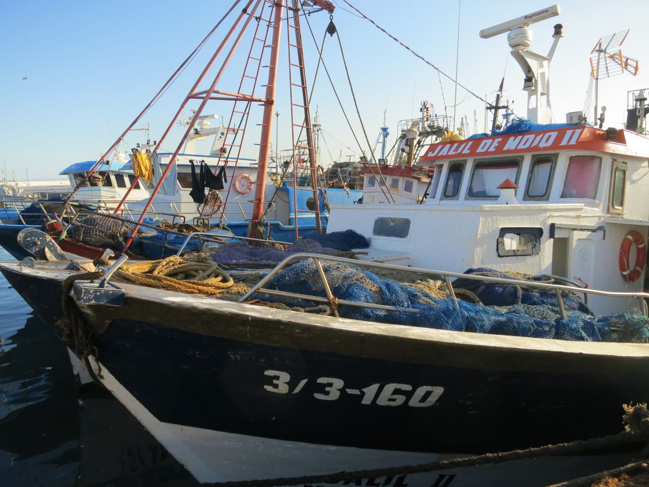 Fishing boats line the harbor at the main port of Tangier.