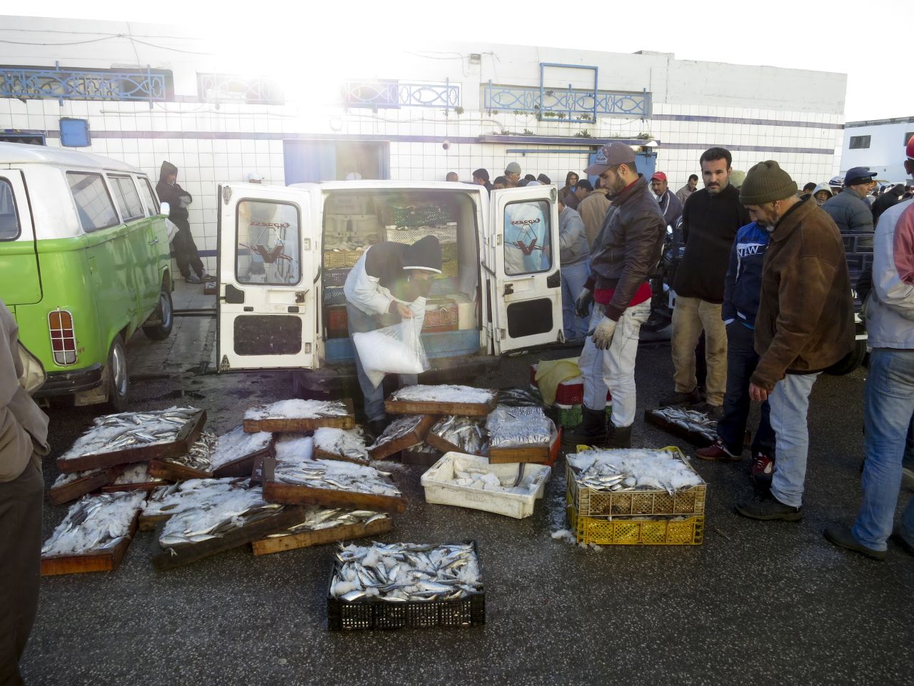 Fishermen work at the fish market at the port of Tangier.