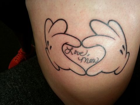 Samantha Pender also chose to tattoo her mother's writing. It's on her thigh, surrounded with Mickey Mouse hands forming a heart because her mom was a <a href="http://ireport.cnn.com/docs/DOC-966572">huge Disney fan</a>. She "would get teary-eyed watching a commercial for Walt Disney World," said Pender. Her dad, brother, and sister-in-law all have similar Disney-themed tattoos in memory of her mom -- although Pender says her mom would probably "roll her eyes" if she knew. "She never understood the point" of tattoos, Pender said.