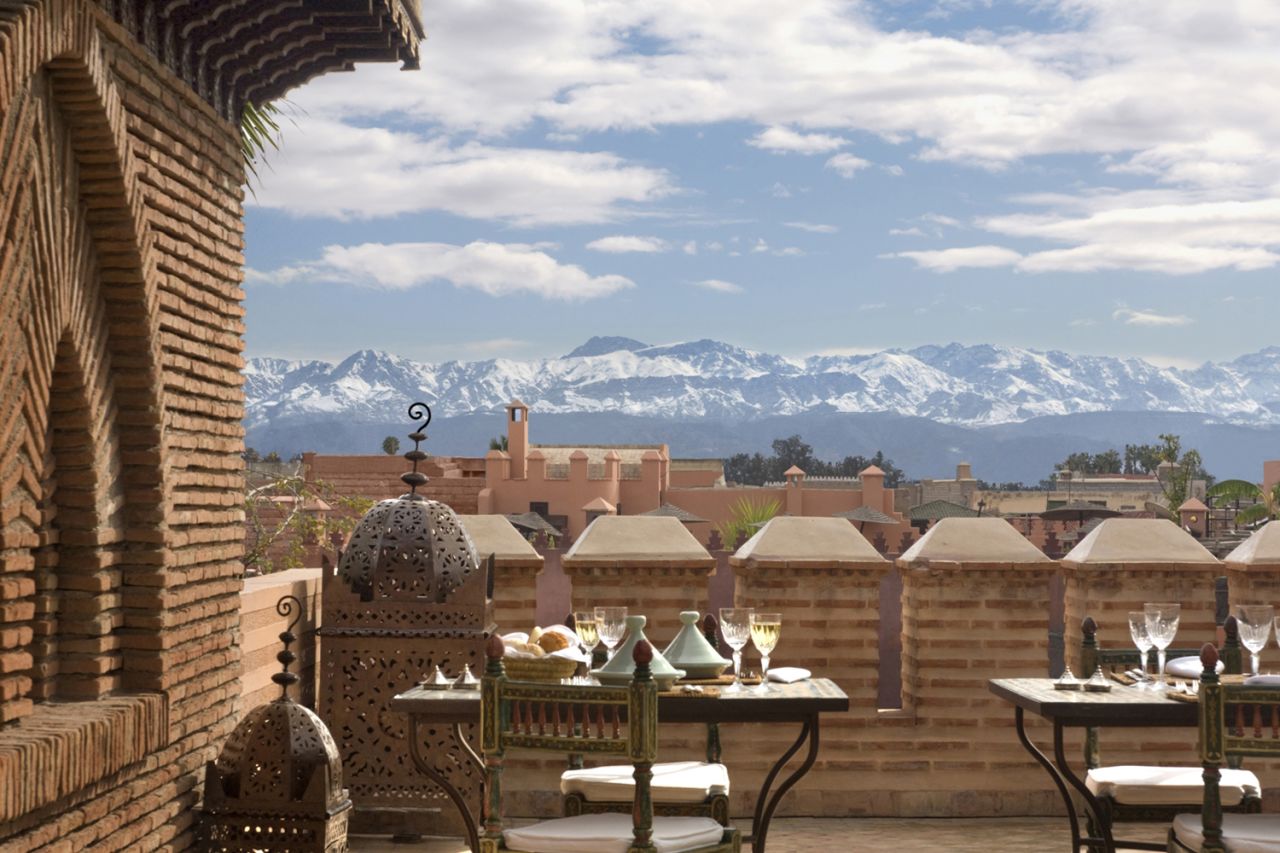 The traditional Moroccan house (riad) comes with the perfect sunset terrace, which often serves as a place to hang the laundry. Visitors will find views of the Atlas Mountains from atop the luxurious digs at La Sultana in Marrakech.