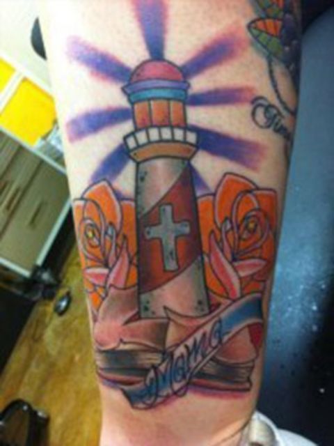 Emily Kirouac wanted the perfect image for her mom tattoo. After much thought, "I chose a lighthouse" on her calf for two reasons: "One, because as long as I can remember, she has collected lighthouses. Two, because my mama is the biggest inspiration in my life," she said. "She is the <a href="http://ireport.cnn.com/docs/DOC-966147">light of my life</a>." Kirouac says her mom isn't a big fan of tattoos, but when she saw it, "she had a tear in her eye and said it was beautiful. That meant everything to me."