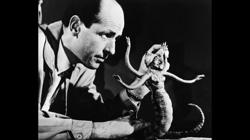 Harryhausen manipulates a figure of a serpent-like monster for a stop-motion animation scene, circa 1965.
