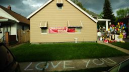 The family house of Gina DeJesus, one of the three women which were held captive for a decade, stands decorated by well wishers May 7, 2013 in Cleveland, Ohio. Three brothers have been arrested in connection with the kidnapping of three women found safe in a home after being missing for a decade, authorities said. There were more questions than answers the day after the stunning turn of events that began with a frantic arm sticking out of a screen door, a woman screaming for help, and a neighbor kicking in the door to free her in a working-class neighborhood of the city in the American heartland. Ariel Castro and his brothers - Pedro, 54, and Onil, 50 have been detained, authorities said.  AFP PHOTO/Emmanuel Dunand        (Photo credit should read EMMANUEL DUNAND/AFP/Getty Images)