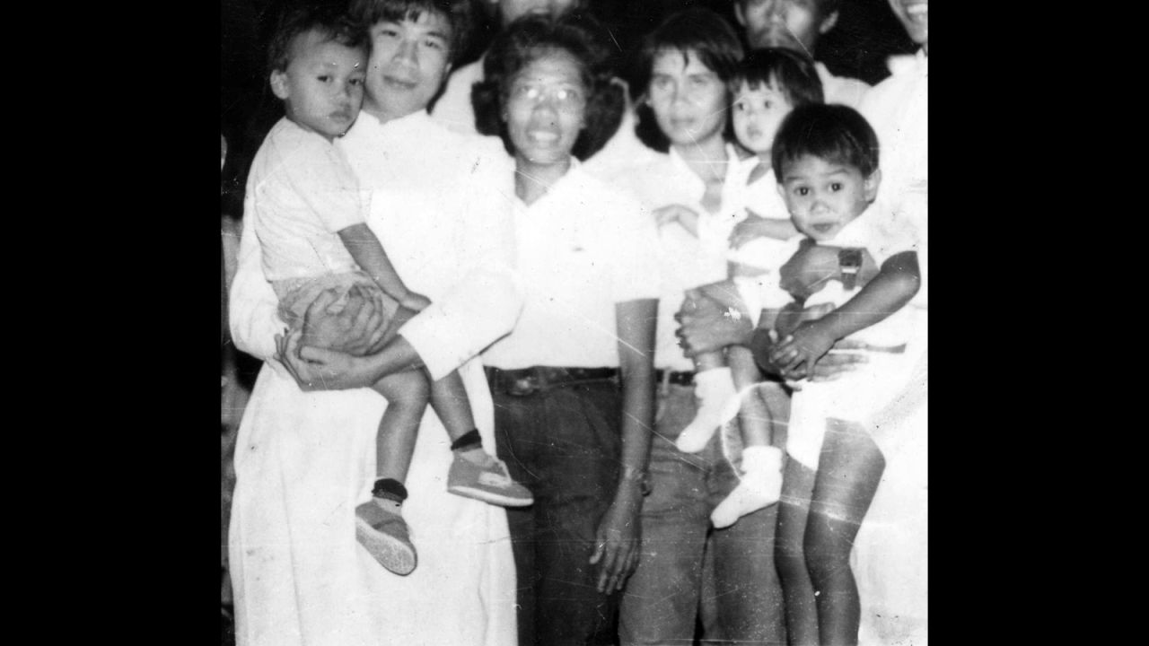 Oebanda's first day outside prison, with her children on February 26, 1986. She was captured while fighting for rebel forces against the dictatorship of President Ferdinand Marcos.