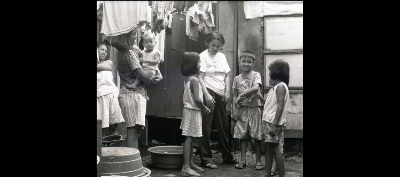 Oebanda is seen in the late 1990's working in poor communities of Manila with the Child Watch Network.