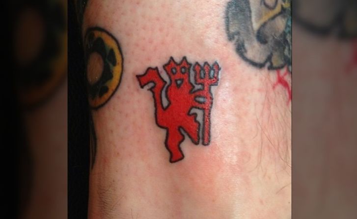 "Lifelong fan" @alexbalding shows his red devil tattoo -- Red Devils is the club's nickname -- done the very morning of the announcement Ferguson was to retire. He said he was "devastated" by the news.
