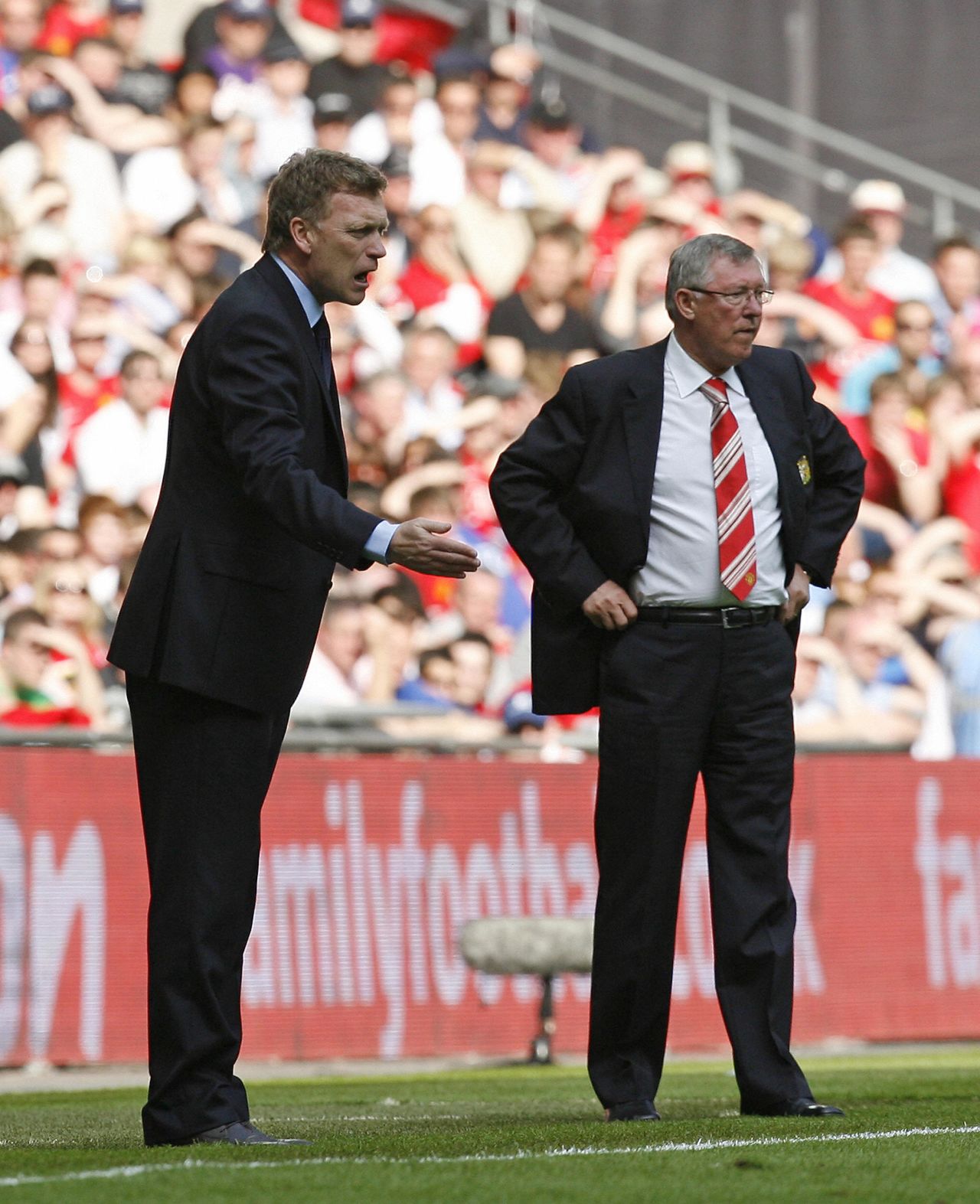Everton manager David Moyes (left) and Manchester United's soon-to-retire boss Alex Ferguson (right) are pictured during the FA Cup semifinal match between their two teams at Wembley Stadium in April 2009. United announced Wednesday that Ferguson, 71, will be retiring at the end of the season after more than a quarter of a century at the helm.