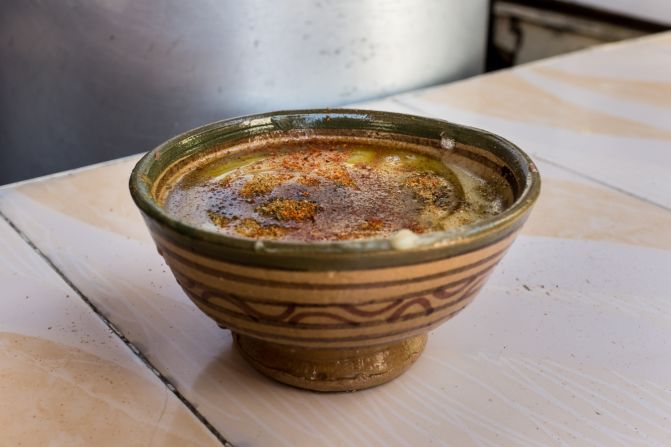 Mopped up with the ubiquitous khobz, a bowl of hearty fava bean soup is a popular workers' breakfast. Hole-in-the-wall eateries also dish it up for lunch with a glug of lemon-infused olive oil and a sprinkle of cumin and chili.