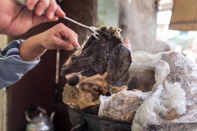 This delicacy is usually eaten for breakfast after a home slaughter during the Islamic festival of Eid al-Adha (Feast of the Sacrifice). To eat a head, wait for the vendor to scrape off the fur. Then sprinkle it with cumin, salt and chili, and scrape out the tender cheek meat and tongue.