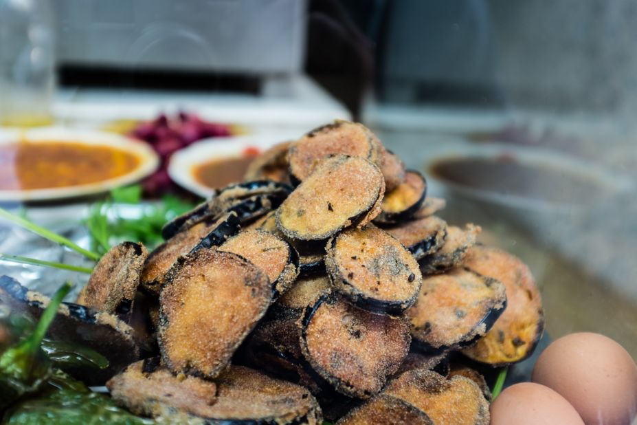 Vegetarians can happily scoff their way through Morocco's souks. One of our favorite veg foods is sliced aubergine dipped in sweet smoked paprika batter and deep fried.