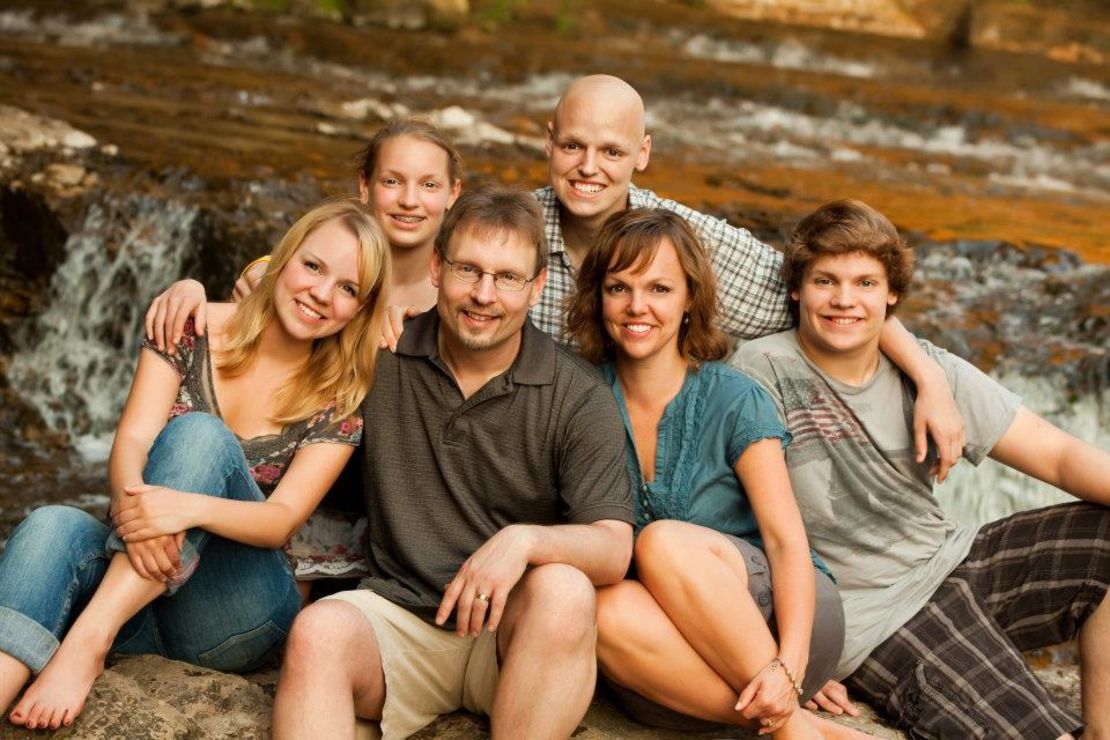 Zach, top, poses for a photo with his family. 