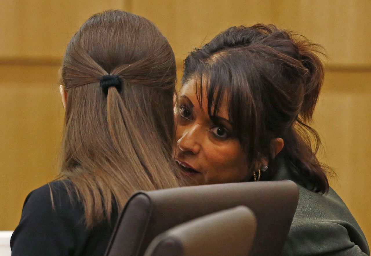 Mitigation specialist Maria DeLaRosa whispers to Arias during closing arguments. Arias' defense team denied that she went on a meticulously planned "covert mission" to Arizona to kill her ex-boyfriend and then hide her tracks.