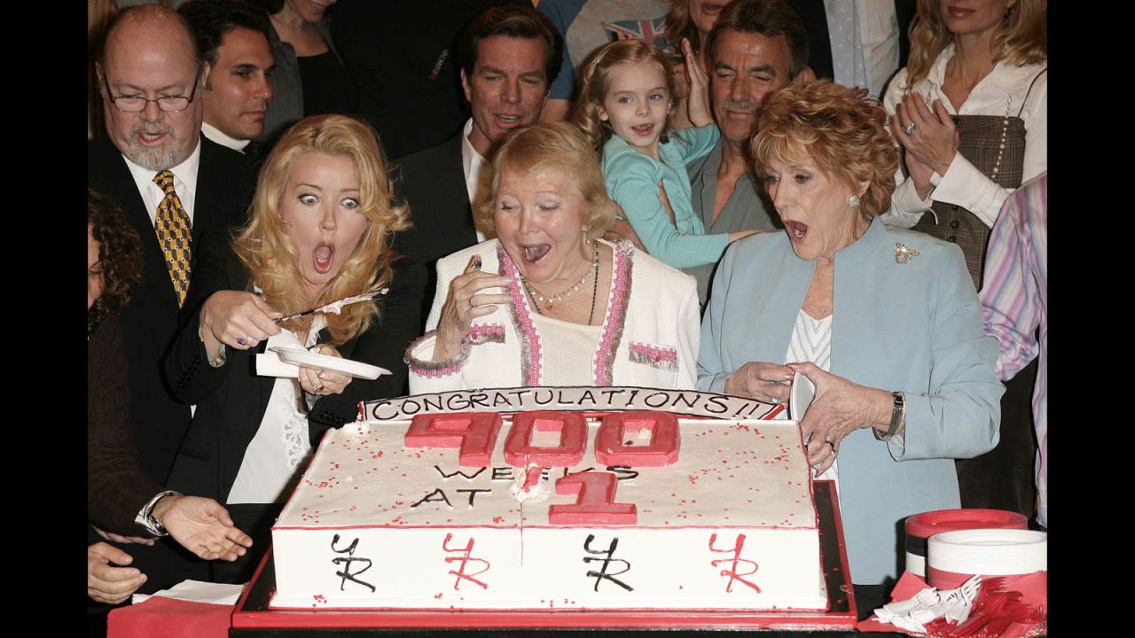 Cooper, right, celebrates the 900th week of "The Young And The Restless" as the No. 1 rated daytime drama with fellow cast members on April 6, 2006.
