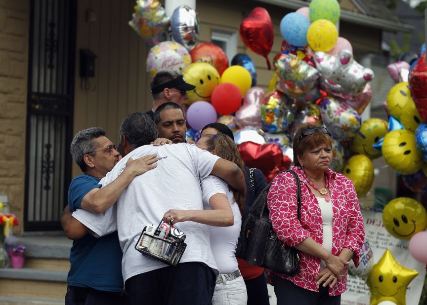Relatives of kidnapping victim Georgina "Gina" DeJesus hug after she returned to her parents' home in Cleveland on May 8.
