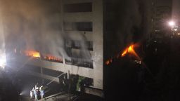 Bangladeshi firefighters attempt to extinguish a blaze at a garment factory in Dhaka early on Thursday, May 9. At least seven people were killed in the latest tragedy in Bangladesh's textile industry. Bodies are still being  pulled from the rubble of a  garment factory that collapsed on April 24, killing at least 900 people.