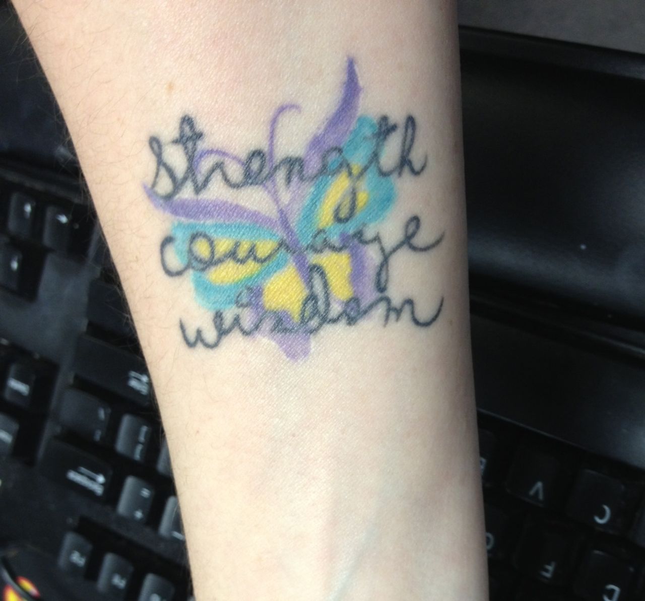 Judy Jordan asked her mother to write out the words <a href="http://ireport.cnn.com/docs/DOC-966180">"strength," "courage" and "wisdom"</a> so that she could have them tattooed on her arm in her mom's handwriting. The words come from the title of an India.Arie song. "Since my mom had to raise my brother and myself on her own, I felt that these words described her perfectly," said Jordan. "I can see it constantly and when I get bogged down thinking how hard being a single parent is, I see my tattoo and realize that I am my mother's daughter, so I'm bound to have some of her strength, courage, and wisdom." 