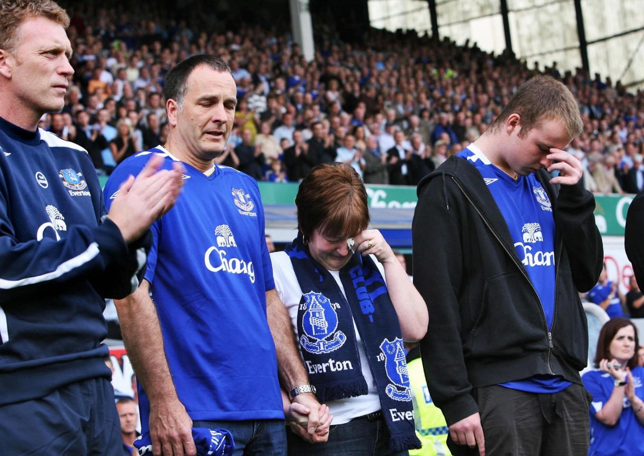 The family of murdered 11-year old boy Rhys Jones stand next to Moyes during a minute's appreciation before the start of the Premier League match between Everton and Blackburn Rovers at Goodison Park in August 2007. Rhys died after being shot in the neck as he played football with friends outside the Fir Tree pub in Croxteth, Liverpool in August. 