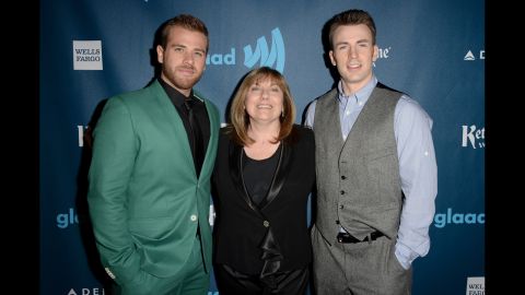 Scott Evans, left, and Chris Evans with their mother, Lisa Evans.