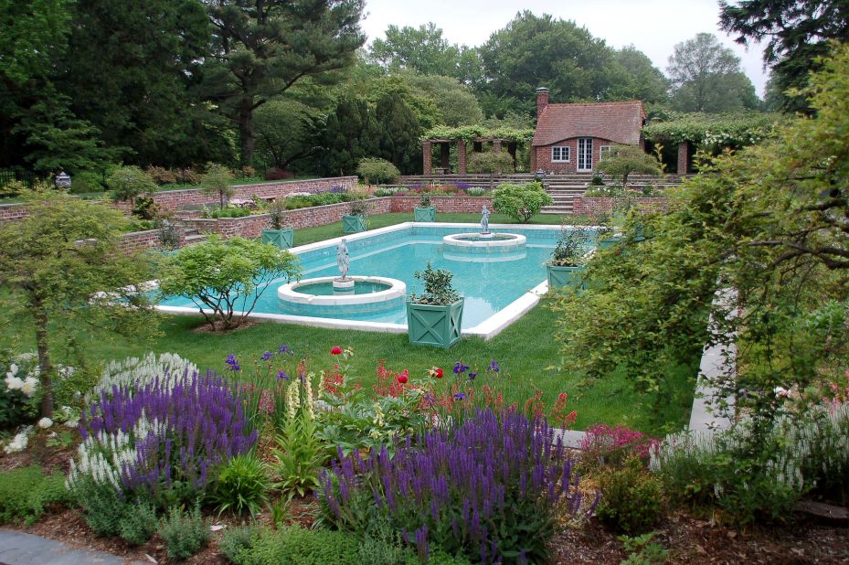 The estate is part of Planting Fields Arboretum State Historic Park, which hosts special exhibitions in a smaller home on the grounds. The arboretum covers 409 acres of lawn, woodlands and formal gardens, including this Italian garden restored in 2010.
