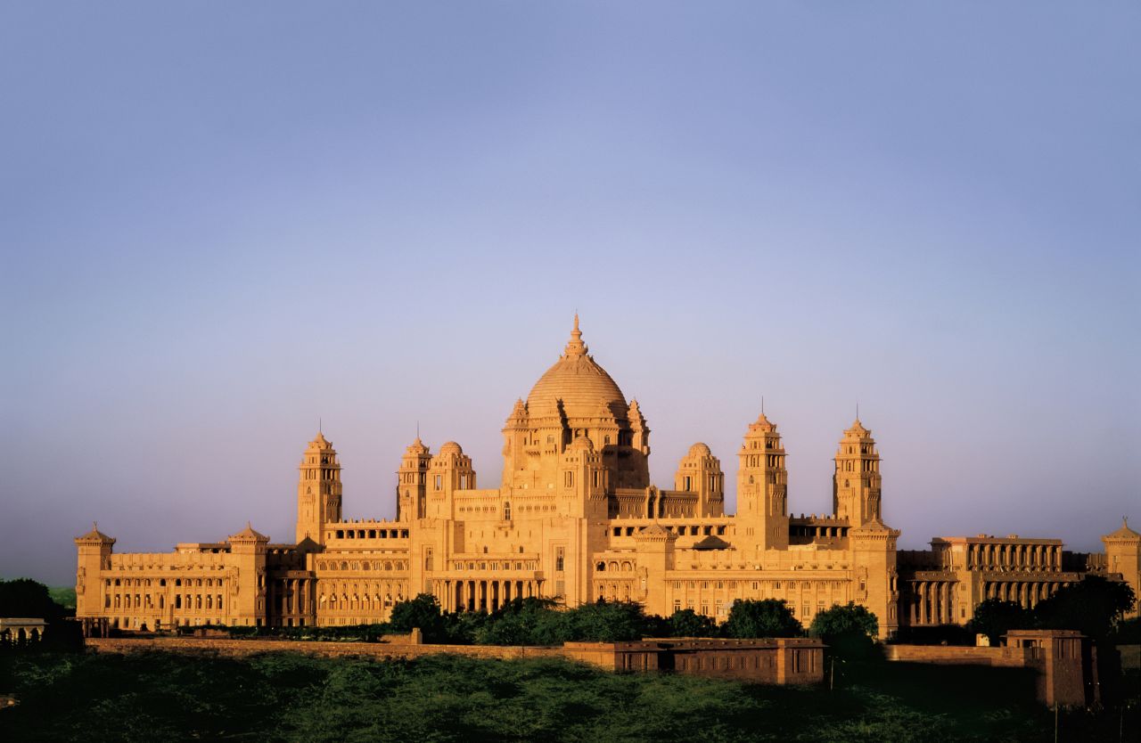 <strong>Umaid Bhawan, Jodhpur: </strong>The spectacular sandstone exterior of the Umaid Bhawan palace in the state of Rajasthan, northwest India. Still the primary residence of the royal Maharaja of Jodhpur, a third of the facility was transformed into a hotel in 1972.