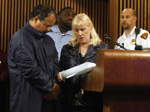 Castro hangs his head while talking with his public defender, Kathleen DeMetz, during his arraignment on May 9, 2013.