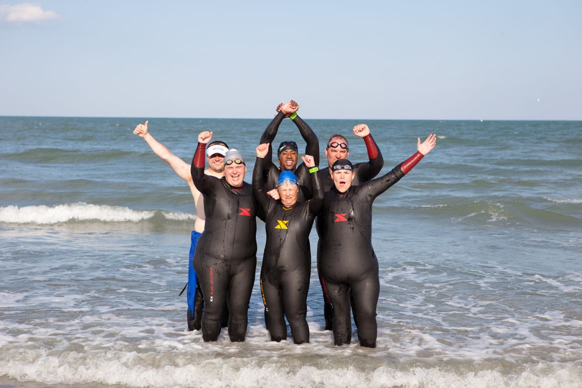 The CNN Fit Nation "6-Pack" conquered the ocean in Clermont, Florida, on their midway training trip in May. Team members <a href="https://twitter.com/TriHardTabitha" target="_blank" target="_blank">Tabitha McMahon</a>, front row from left, <a href="https://twitter.com/TriHardRae" target="_blank" target="_blank">Rae Timme</a>  and <a href="https://twitter.com/TriHardAnnette" target="_blank" target="_blank">Annette Miller</a> and <a href="https://twitter.com/triharddouglas" target="_blank" target="_blank">Douglas Mogle</a>, back row, from left, <a href="https://twitter.com/TriHardClevelan" target="_blank" target="_blank">Will Cleveland</a> and <a href="https://twitter.com/TriHardStacy" target="_blank" target="_blank">Stacy Mantooth</a> are training to race the 2013 Nautica Malibu Triathlon on September 8 alongside CNN's Dr. Sanjay Gupta. 