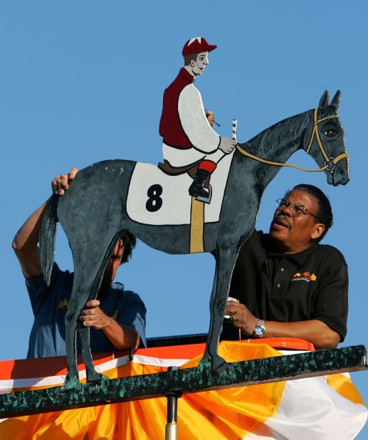 Each year the weather vane atop Pimlico Race Course's Old Clubhouse is painted in the winning jockey's colors. The unusual tradition started in 1909 after the building's original arrow-shaped weather vane was struck by lightning and replaced with an ornamental iron rider and horse.