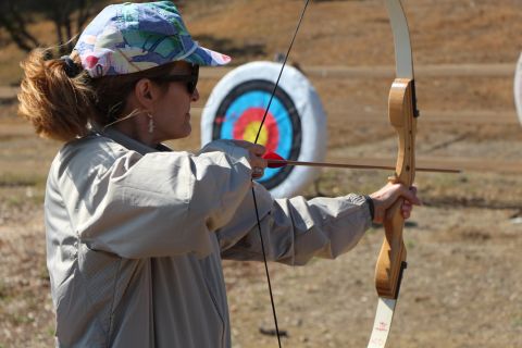 At Campowerment, women enjoy traditional camp activities such as archery.