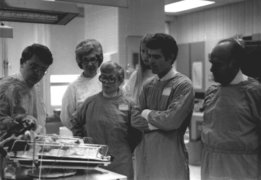 Brann, far left, talks to his colleagues at Grady Memorial Hospital in Atlanta in an undated photo.